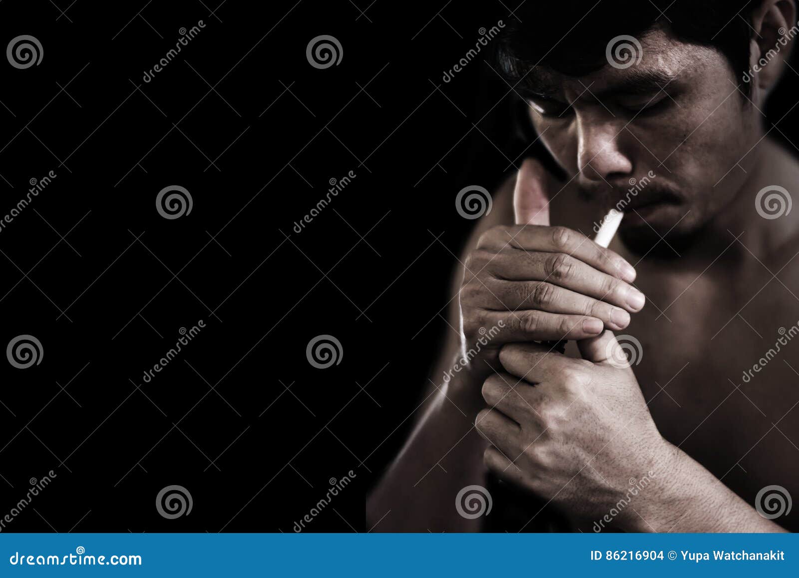 Man lighting cigarette stock photo. Image of black, serious 86216904