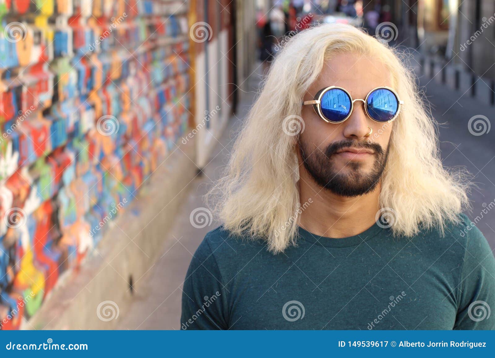 Man With Long Blonde Dyed Hair And Cool Sunglasses Stock Image
