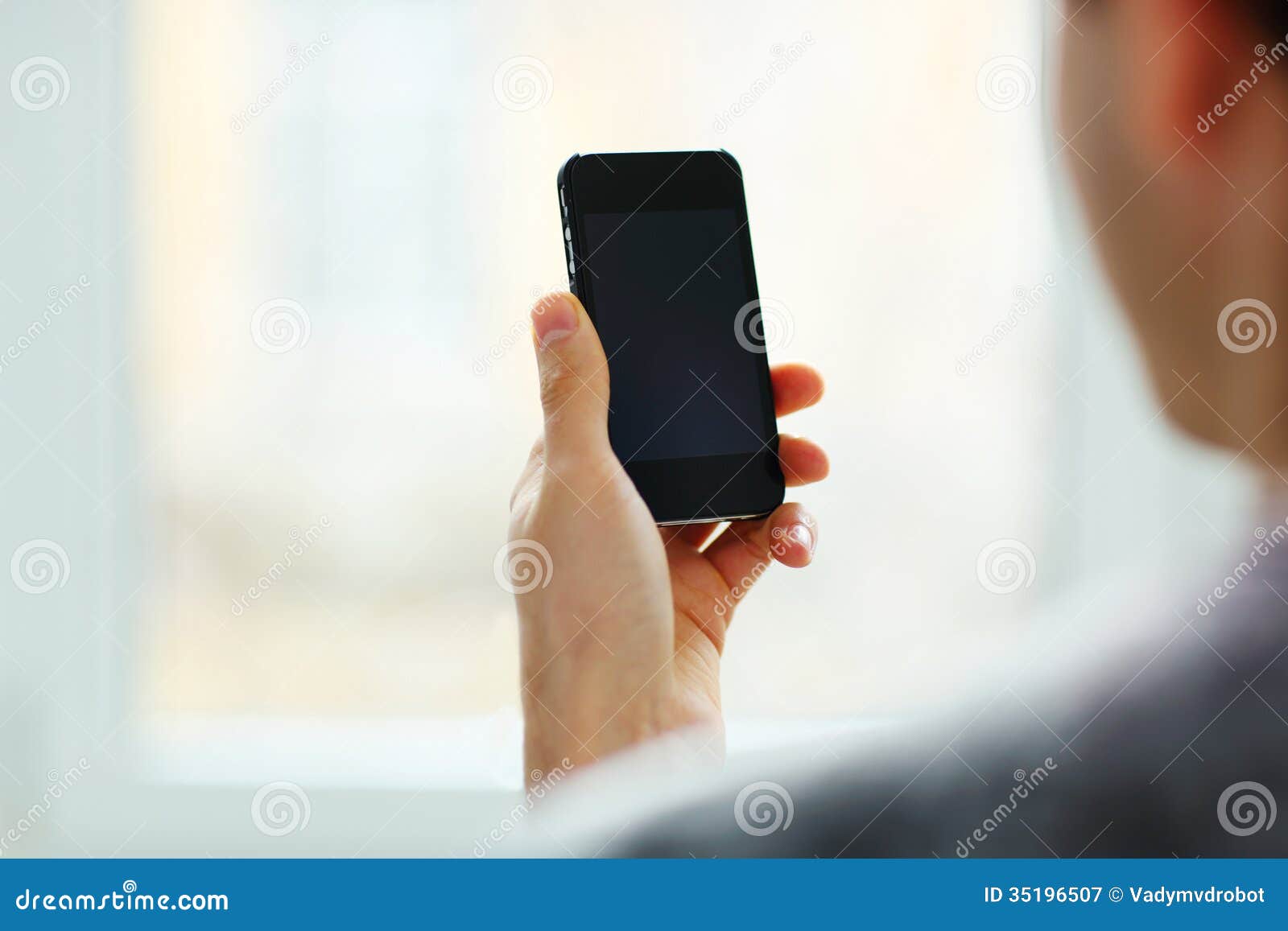 Man Looking at Blank Smartphone Display Stock Image - Image of person ...