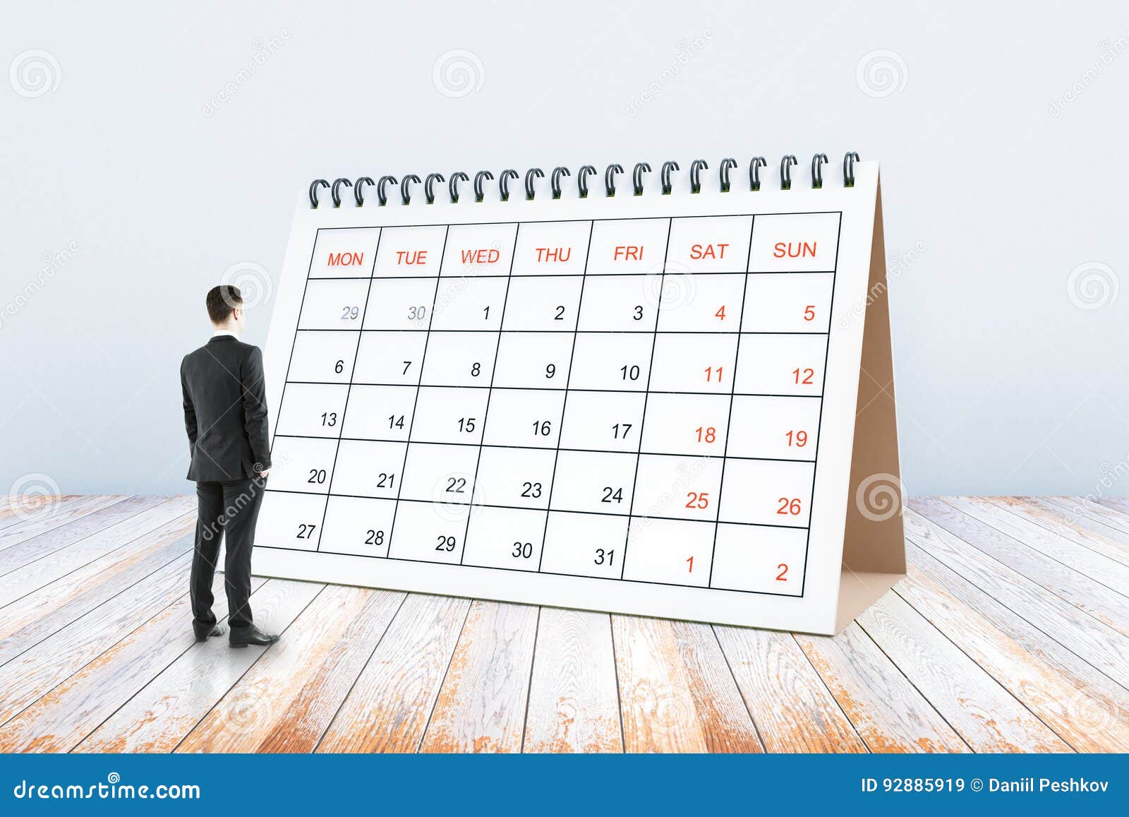 Man looking at calendar stock image. Image of february 92885919