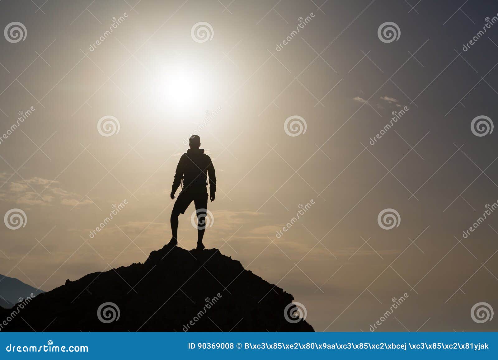 man looking and celebrating sunrise and landscape