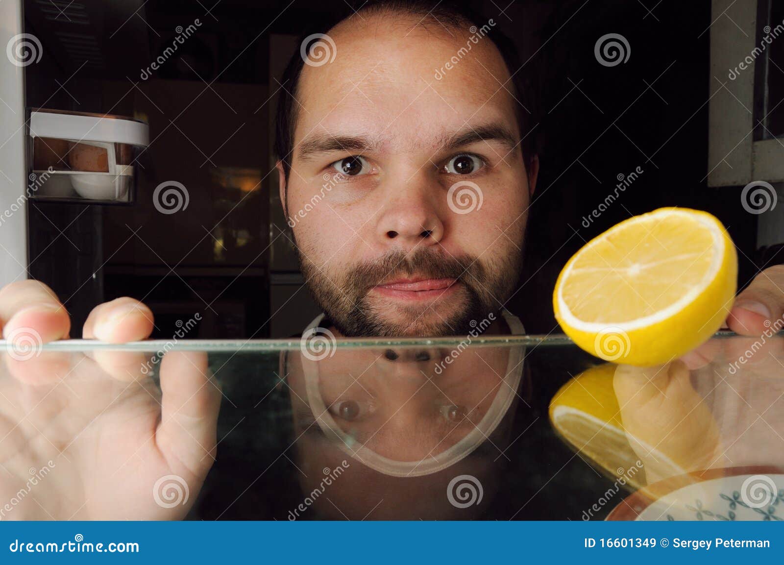Man is looking for food stock image. Image of heavy, door 16601349