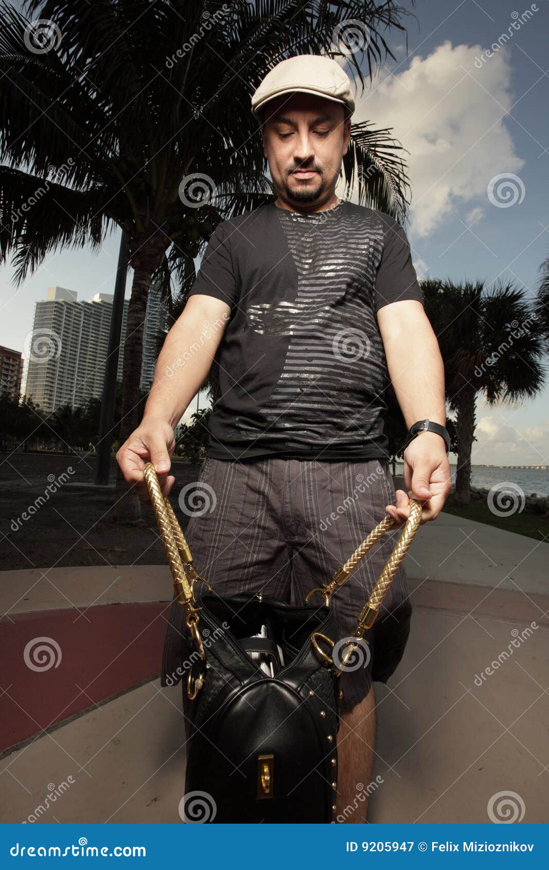 Man looking in a purse stock image. Image of glance, purse 9205947