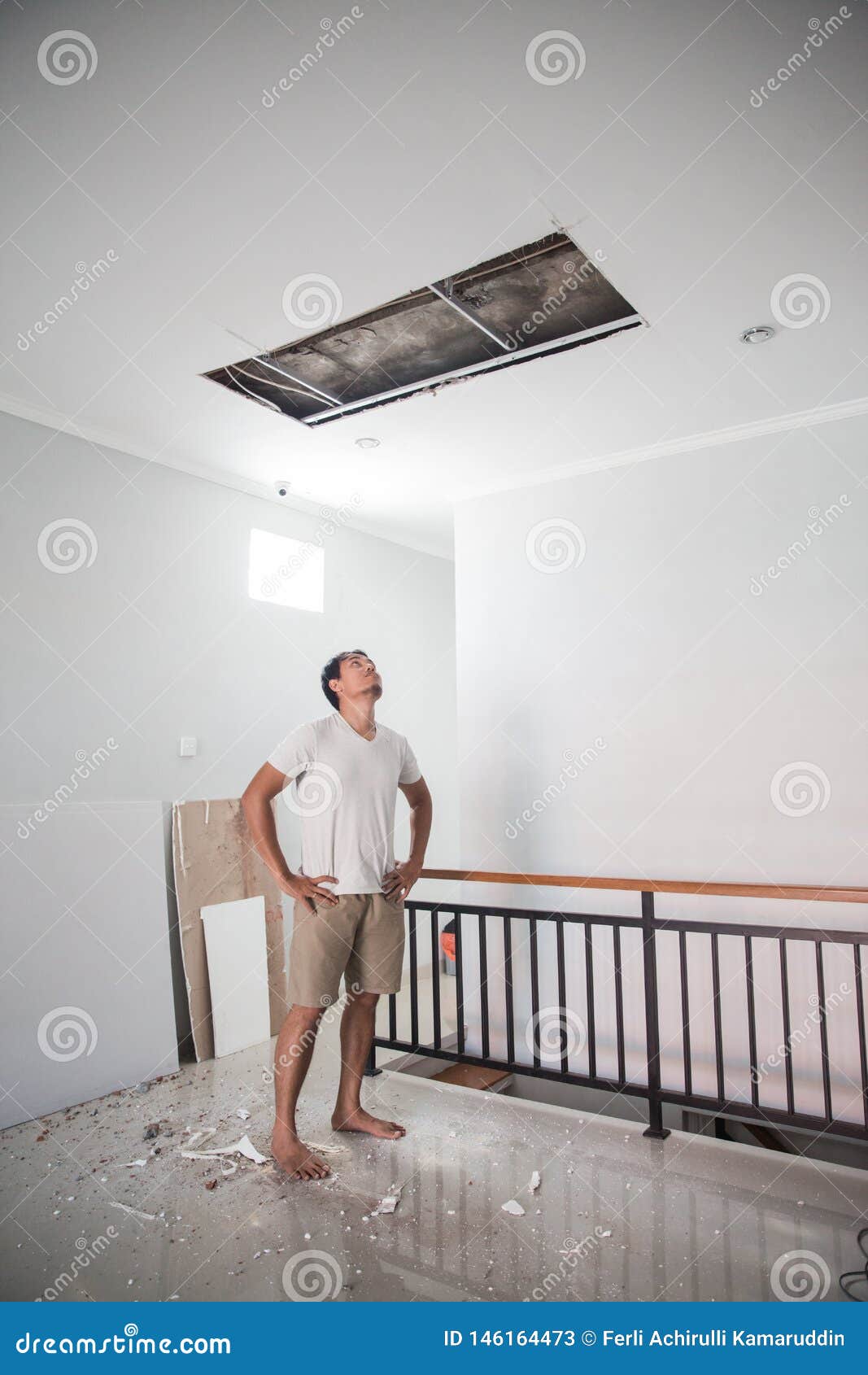Man Looking Up The Broken Ceiling Stock Image Image Of Safety