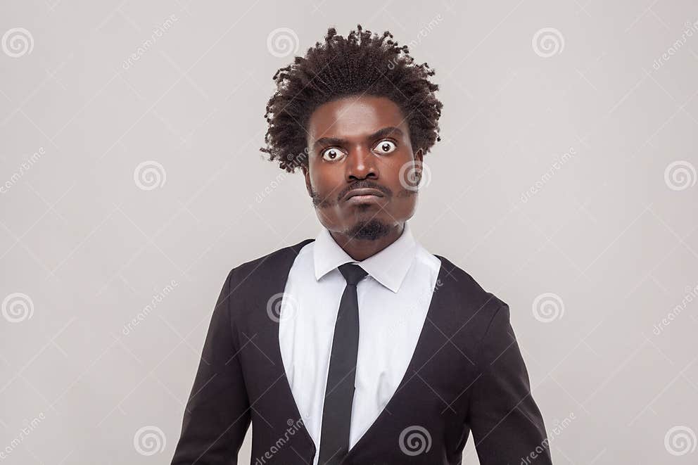 Man Looks with Angry Strict Expression Gazes Directly at Camera, Has ...