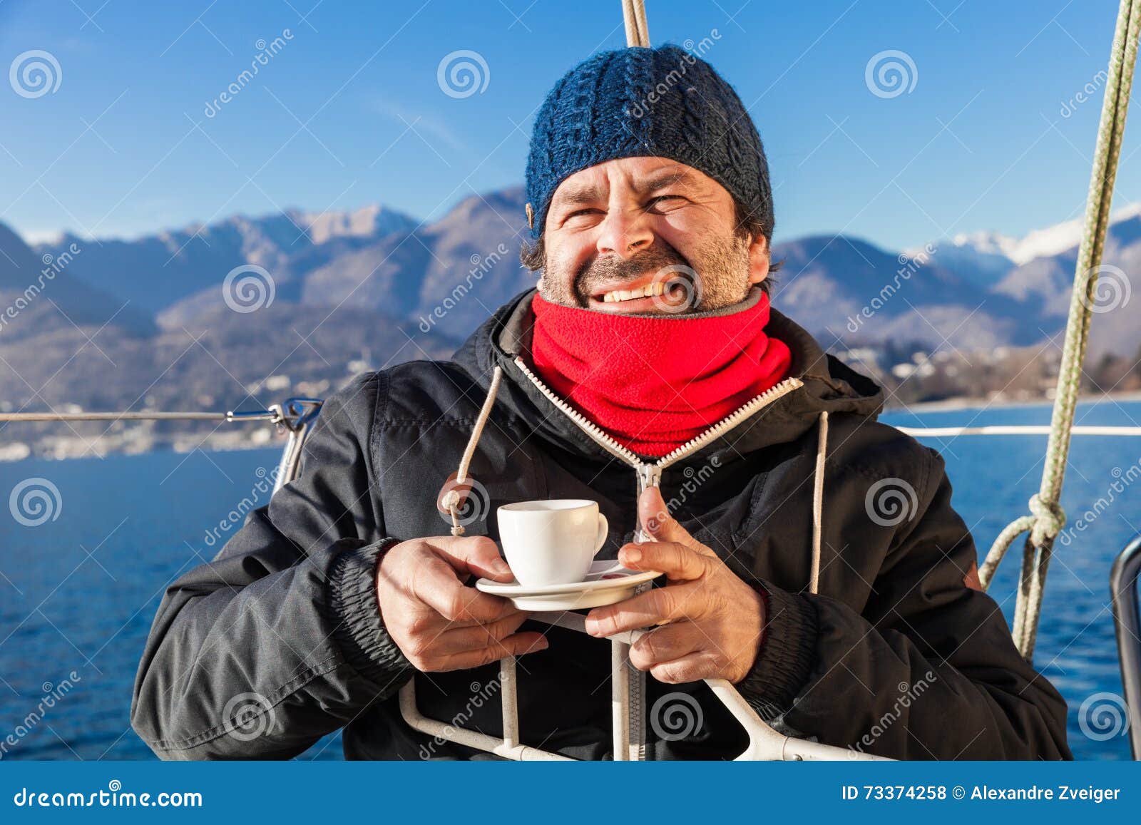 Man Makes a Coffee Break on Sailboat Stock Photo Image of board