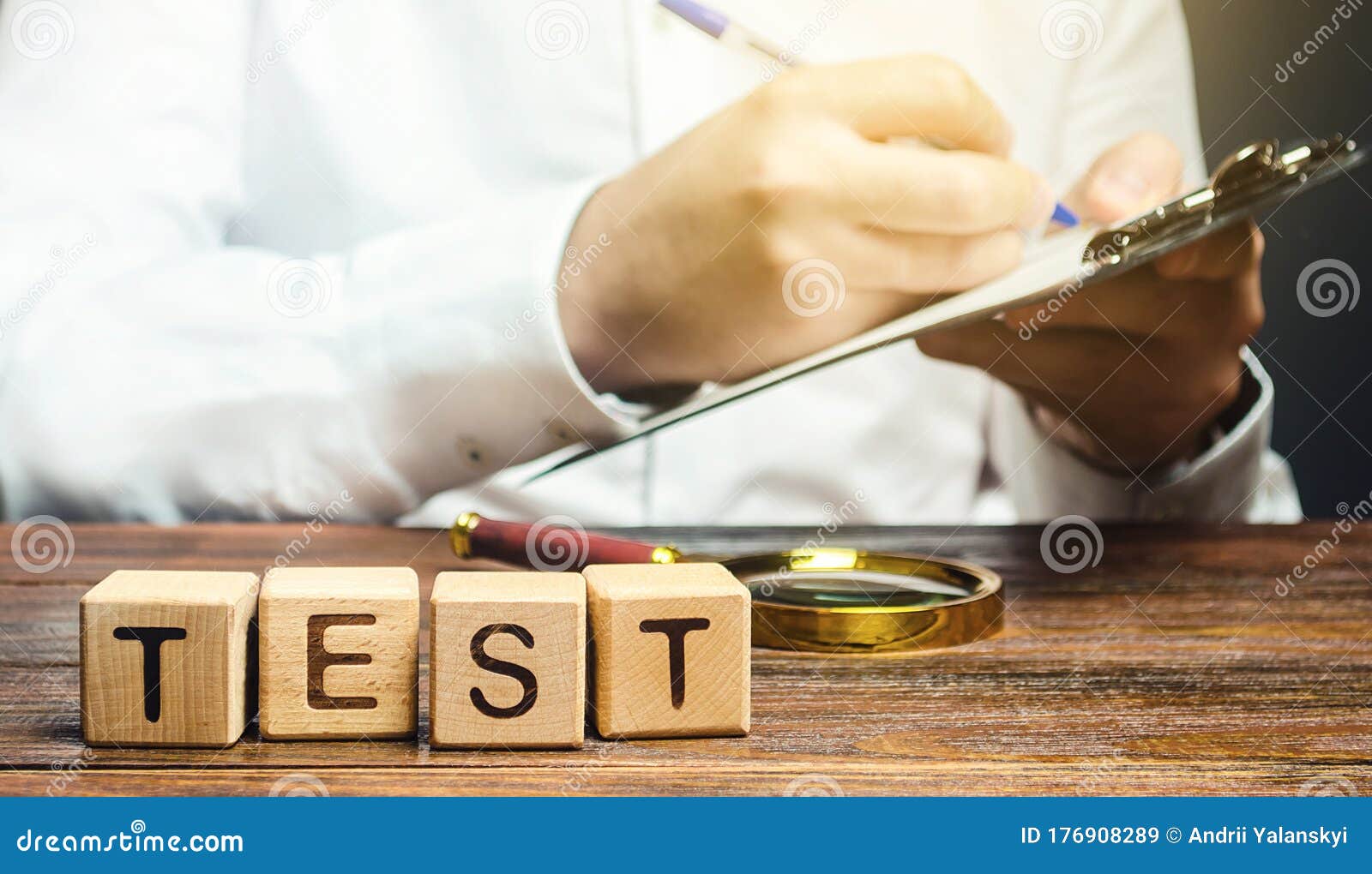 man makes a test and writes results to a clipboard. quality control, organization process management. medical testing for