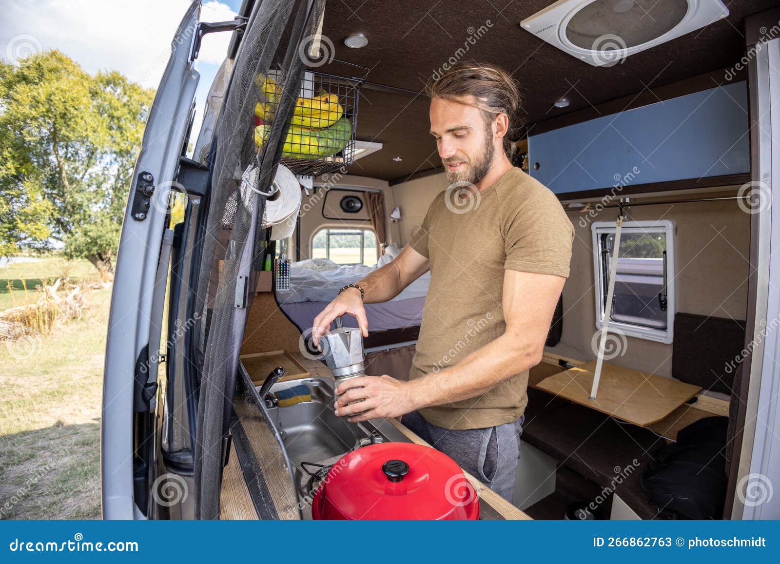 Man Making Coffee in a Camper Van Kitchen Stock Image Image of