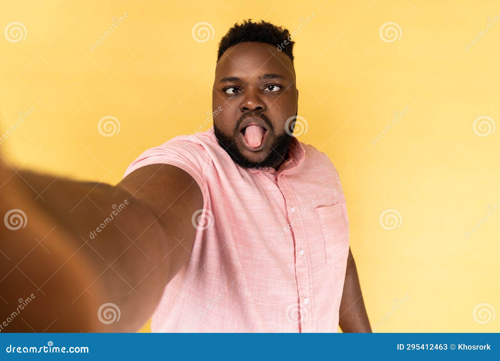 Man Making Point of View Photo, Looking at Camera with Crossed Eyes and