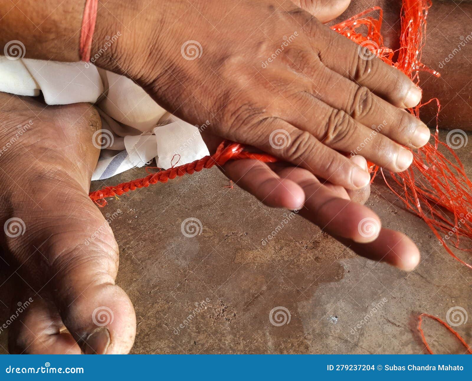 A Man Making Ropes in a Traditional Way. Stock Photo - Image of