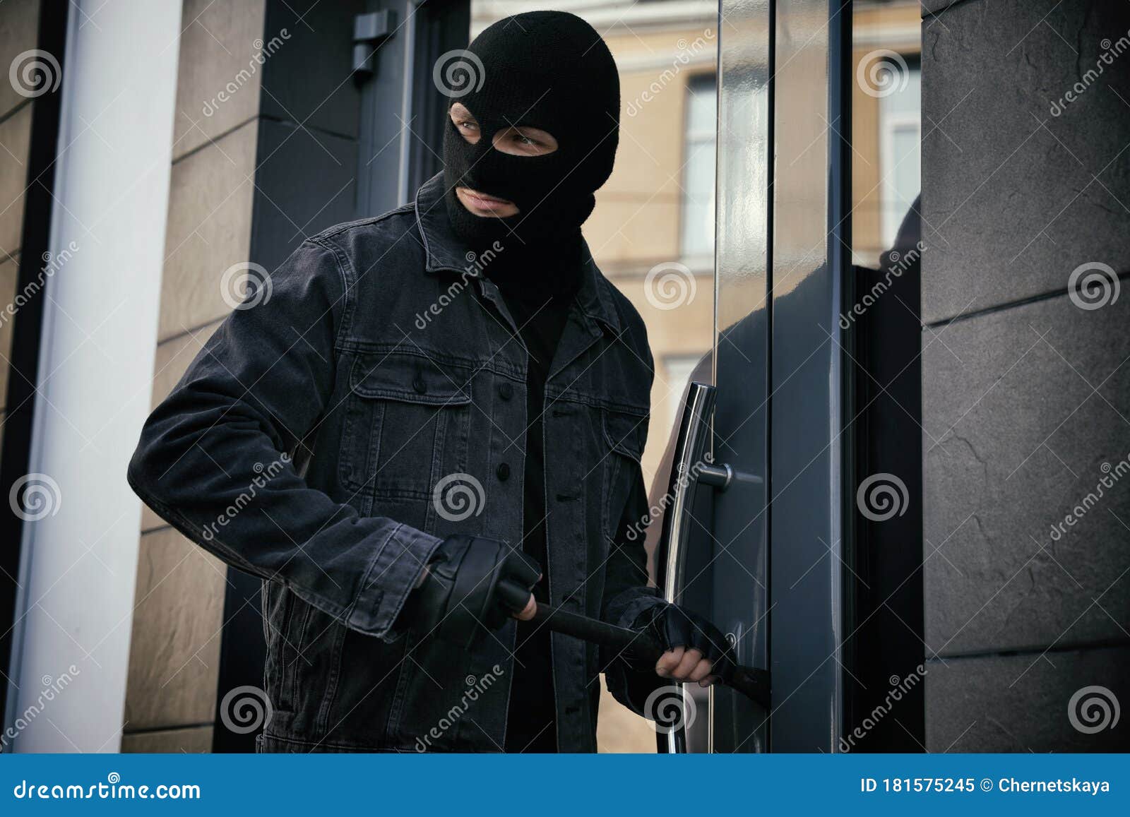 Man in Mask Forcing Door with Crow Bar Stock Image - Image of male ...