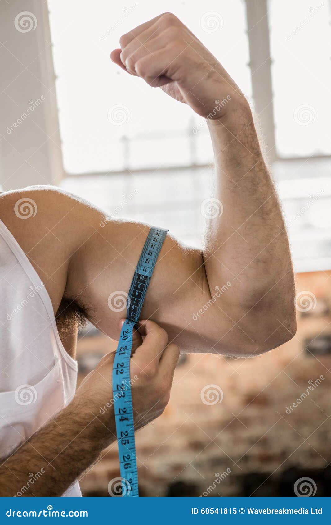 Man Measuring Biceps with Tape Stock Image Image of crossfit