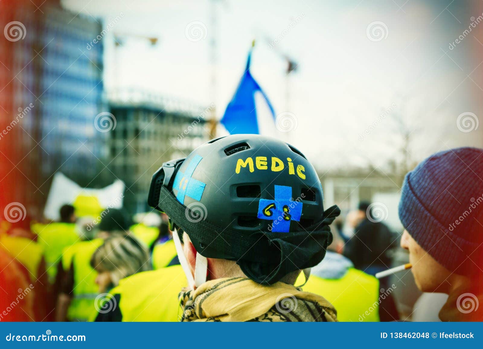 Man with Medic Helmet Walking Near Gilets Jaunes Editorial Stock Photo - of helmet, protest: 138462048