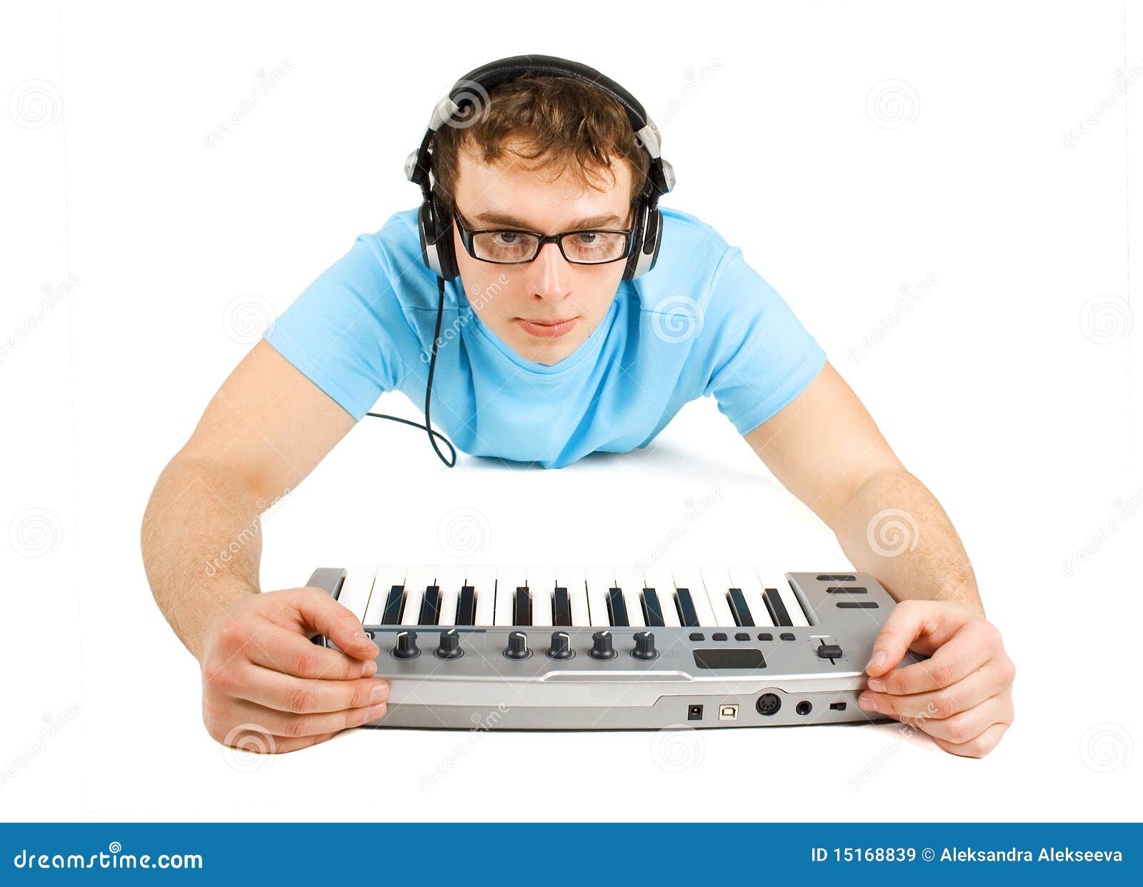 Man with Midi Keyboard and Headphones Lies Stock Image Image of midi