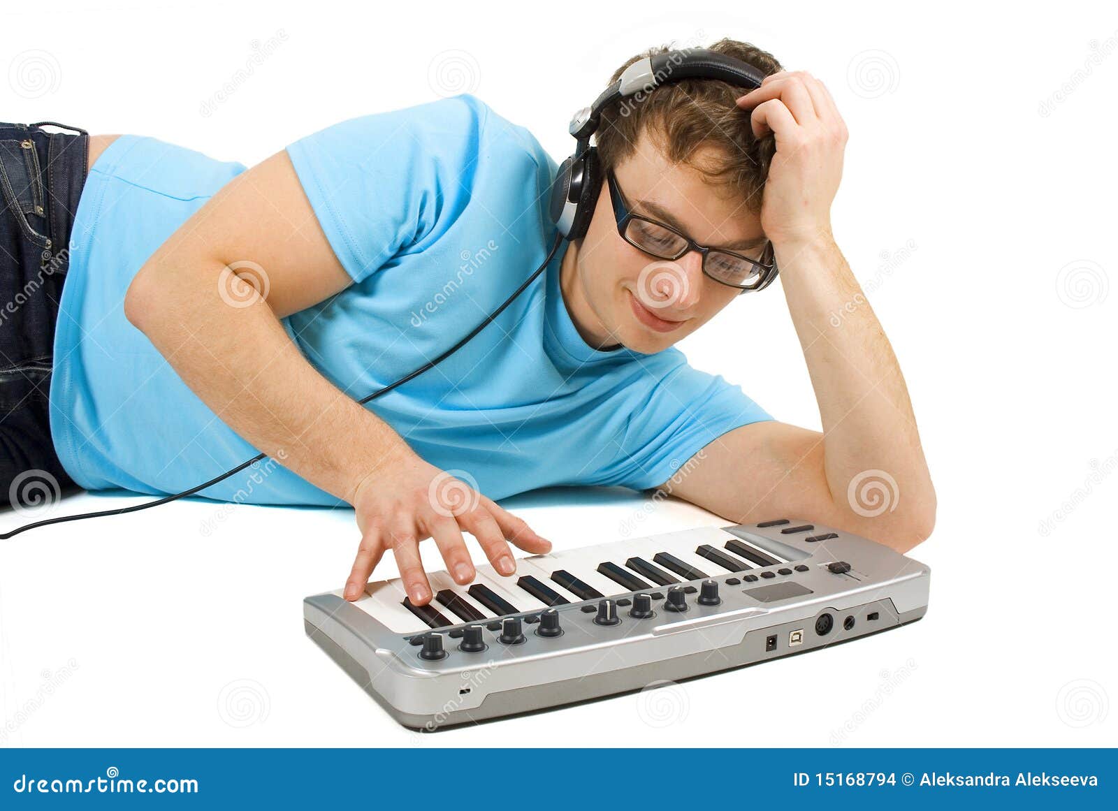 Man with Midi Keyboard and Headphones Standing Stock Photo Image of