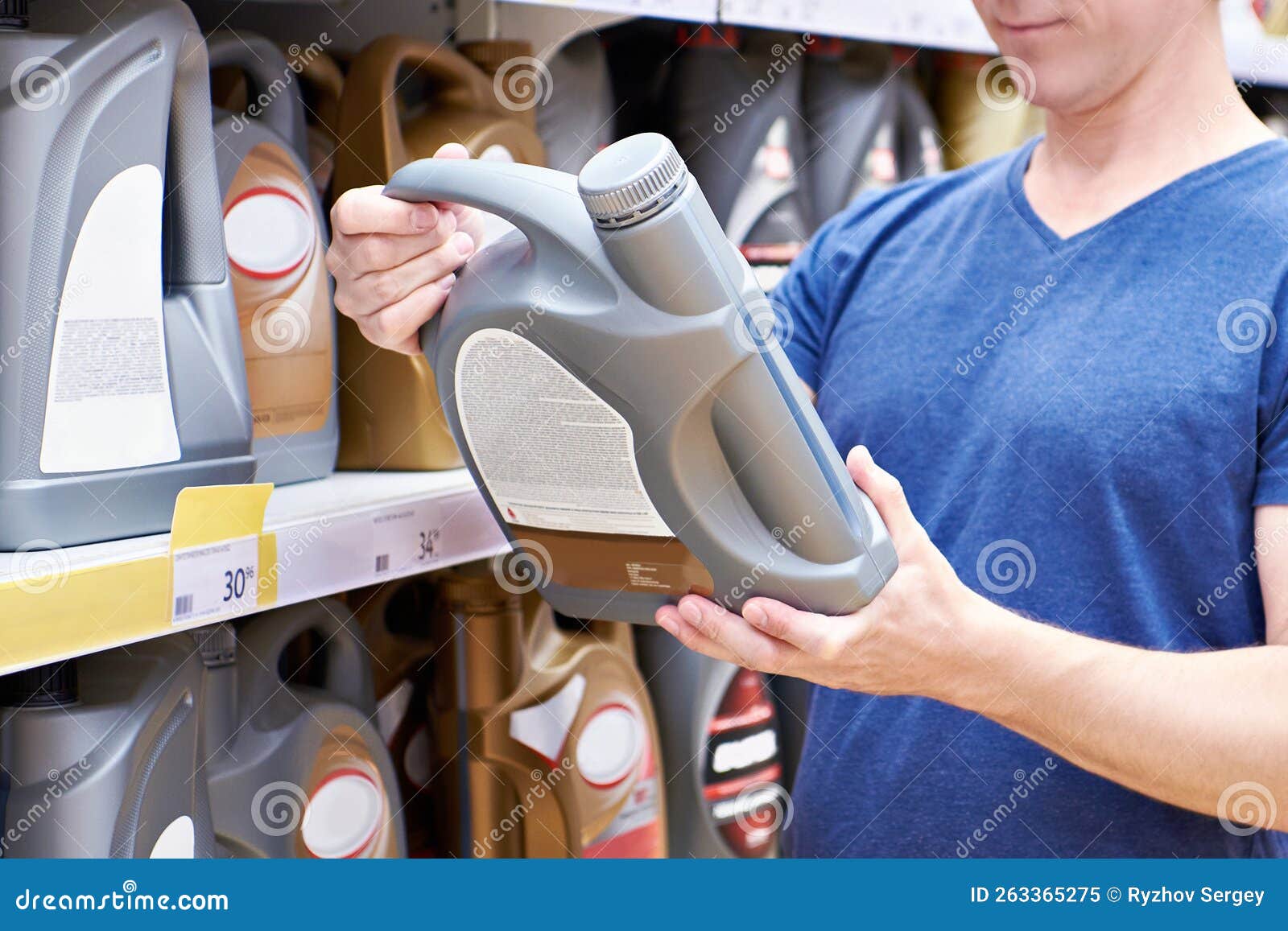 Man with Motor Oil in Store Stock Image Image of canister, person
