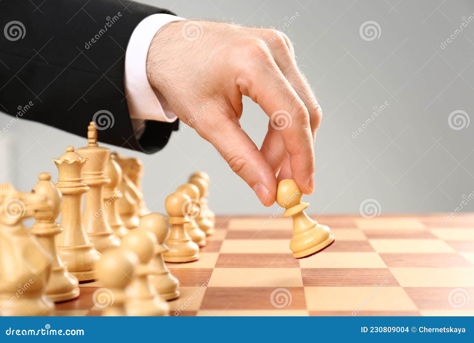 Hand Man Taking Chess Piece Make Next Move Chess Game Stock Photo by  ©guruxox 640426472