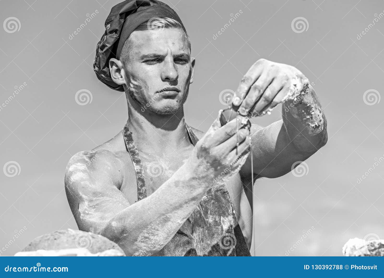 Man Muscular Baker Or Cook Covered With Flour Working Outdoor Sky On 