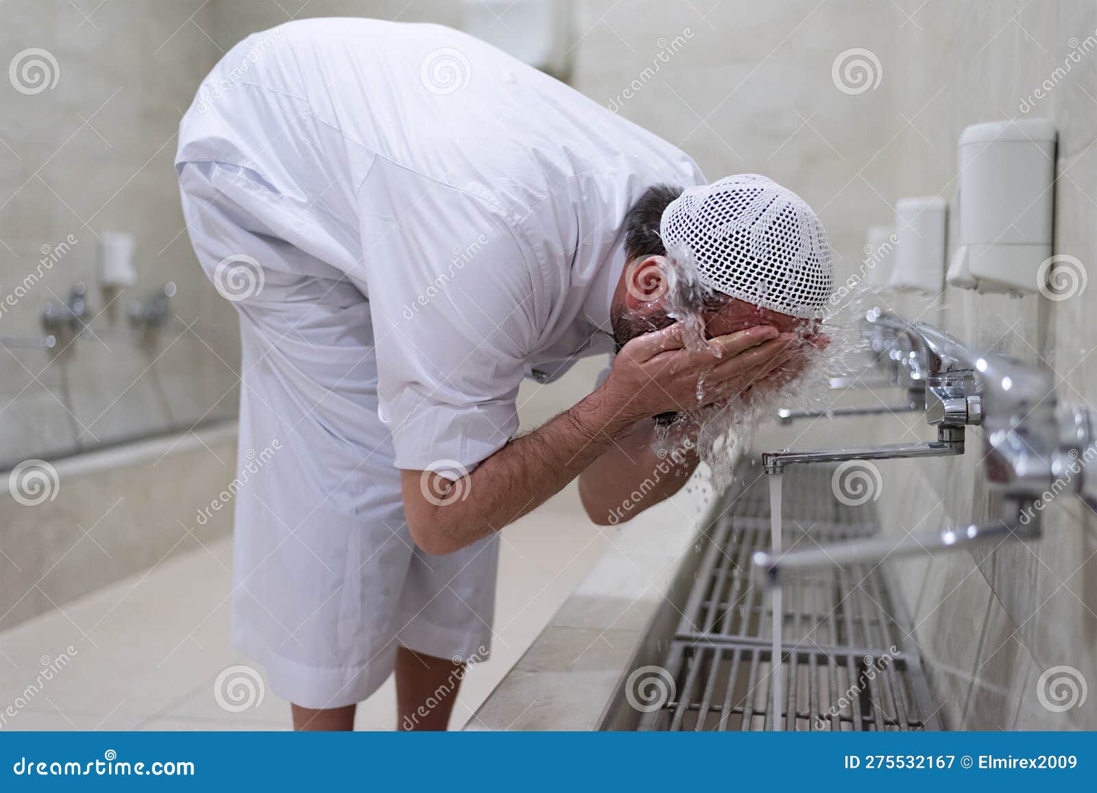 Man Muslim Perform Ablution or Wudu at the Mosque. Washing before Pray