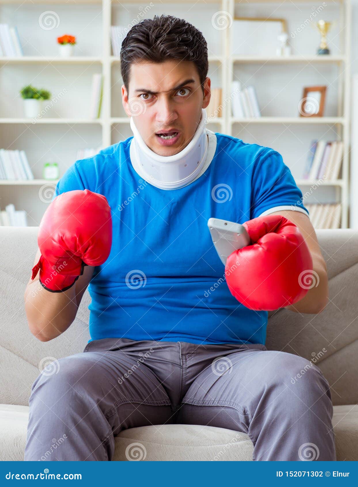 Man with Neck Injury Watching Boxing at Home Stock Photo Image of