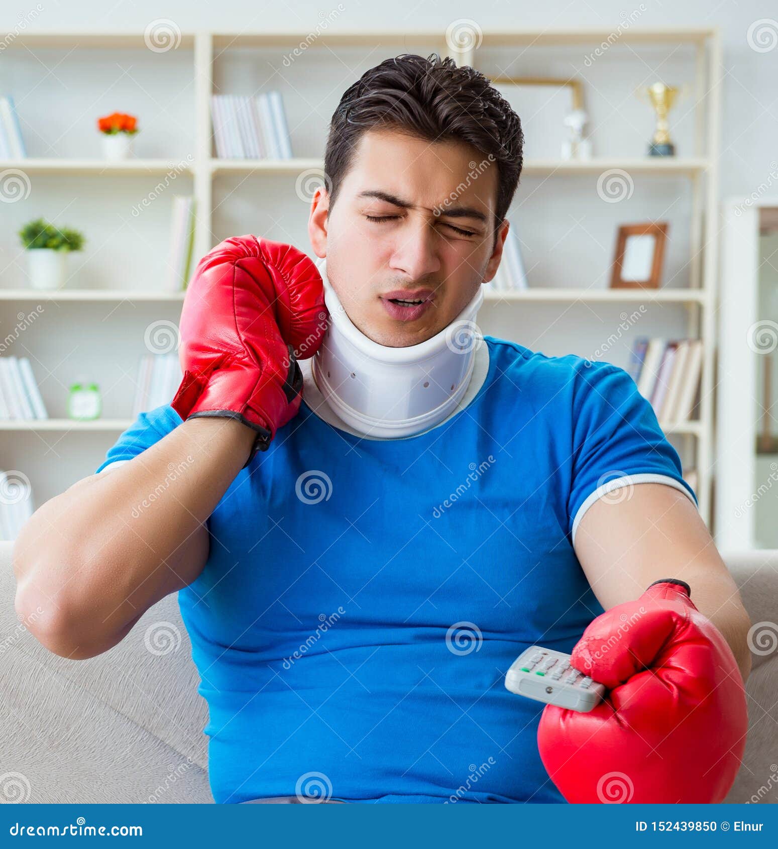 Man with Neck Injury Watching Boxing at Home Stock Photo Image of