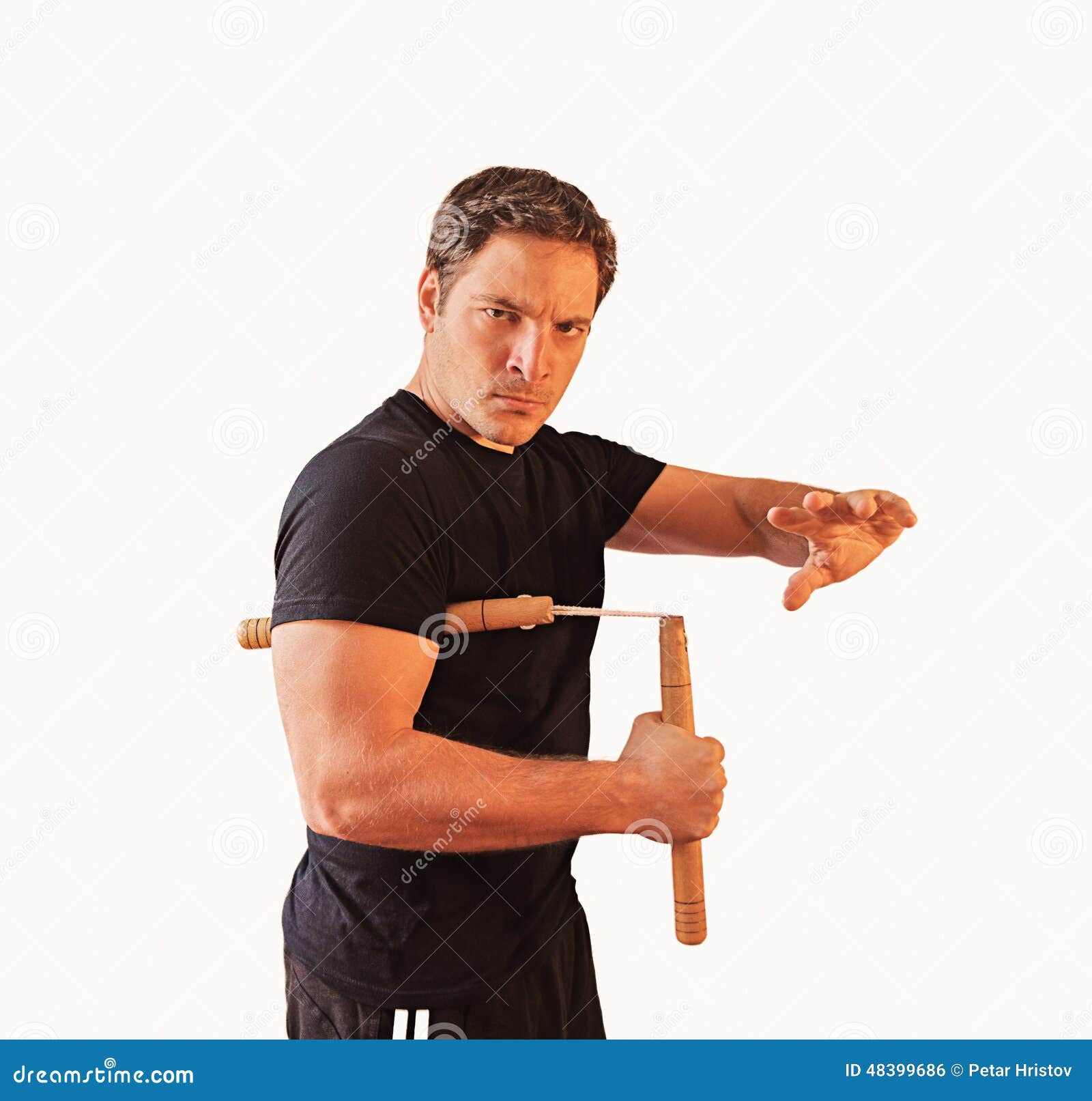 Man in with nunchucks stock photo. Image of attack, muscular 48399686