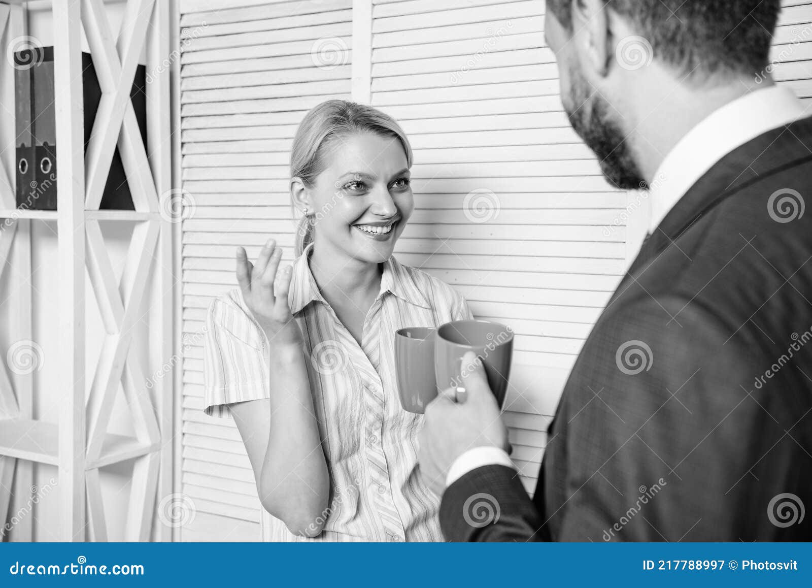 Man Offer Cup of Coffee To Woman. Happy Woman Talking with Boss Coffee ...