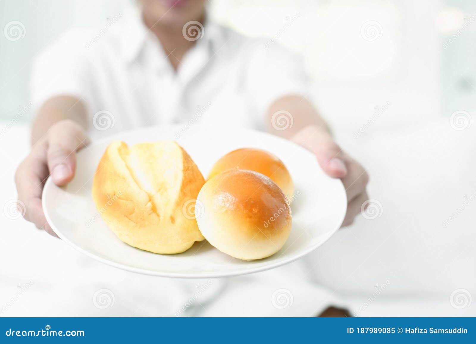 Man Offering Bread and Buns Stock Image Image of food, beverage