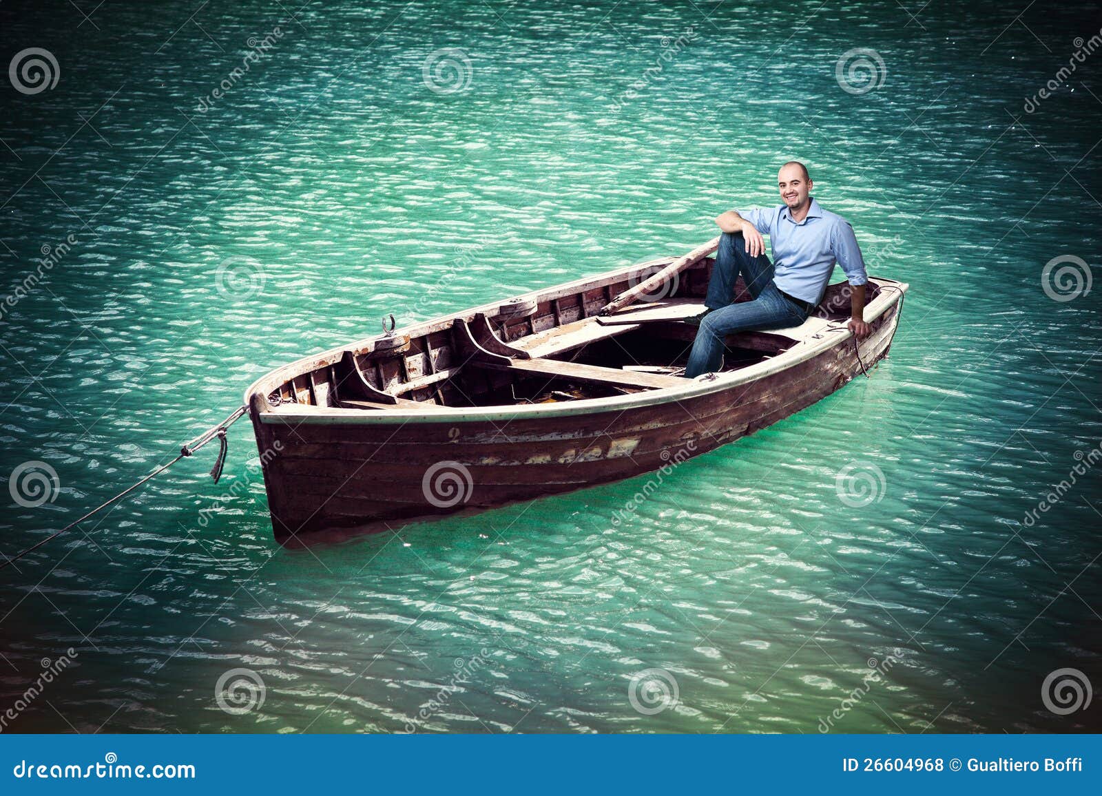 Man Old Boat Stock Photos - Download 6,750 Images