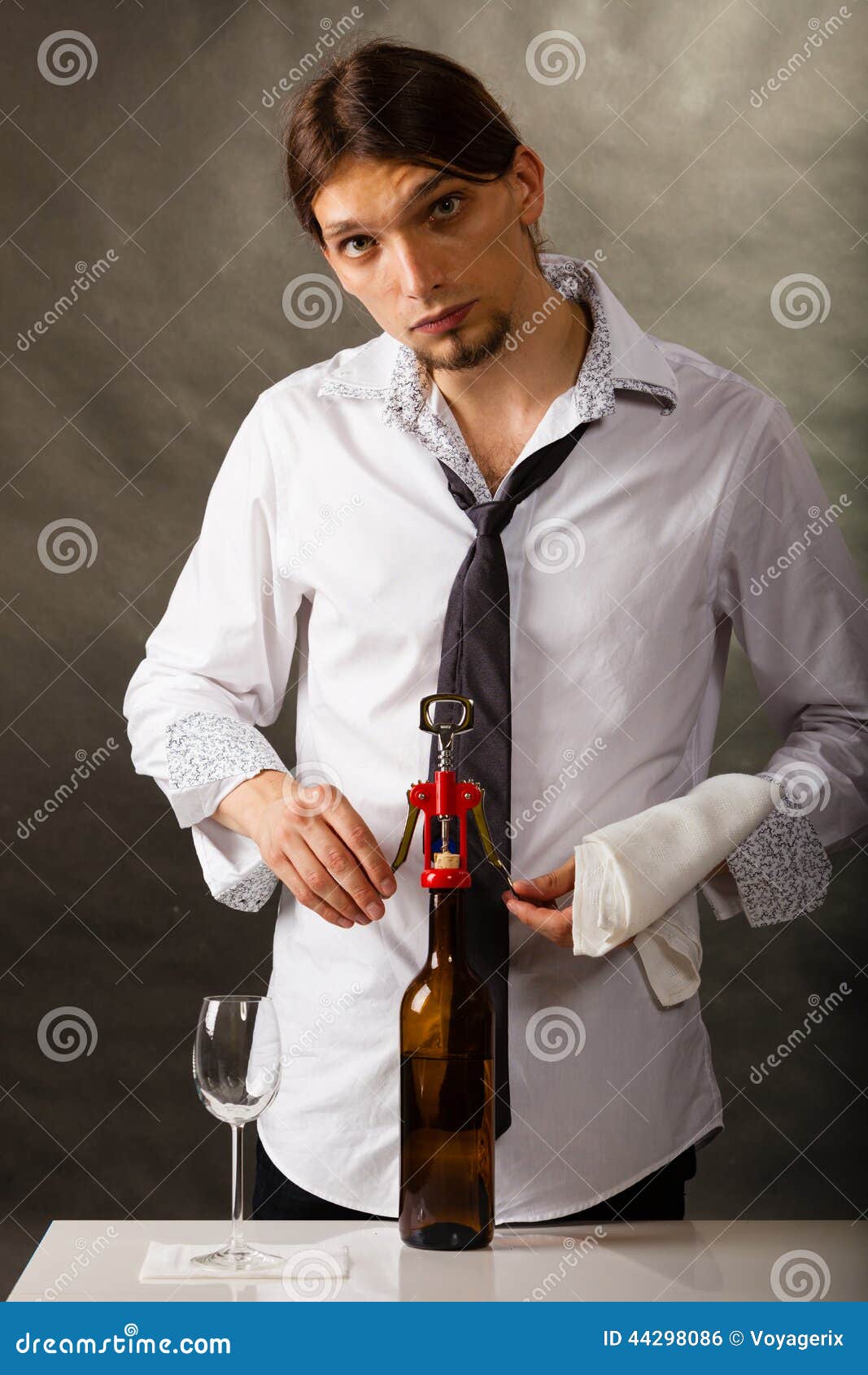 Man Opening Bottle of Wine with Corkscrew Stock Photo Image of wine