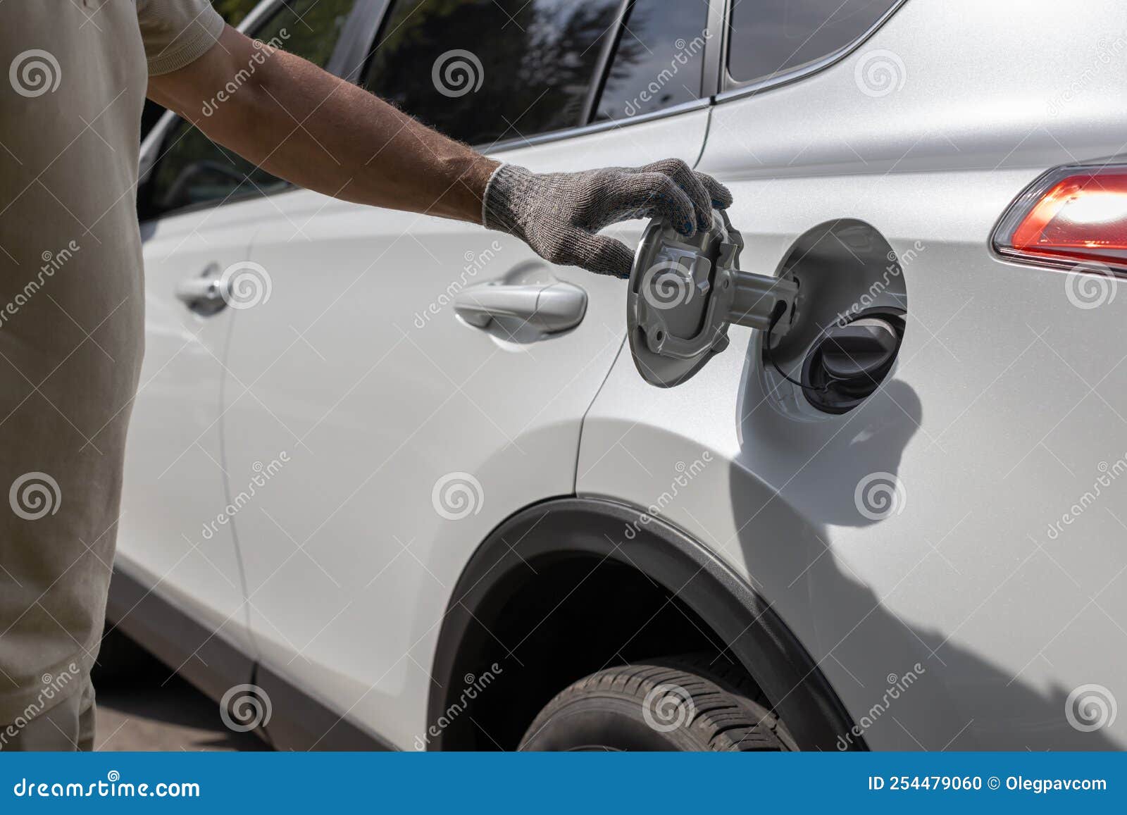 Man Opens the Hatch of the Gas Tank of the Car Stock Photo Image of