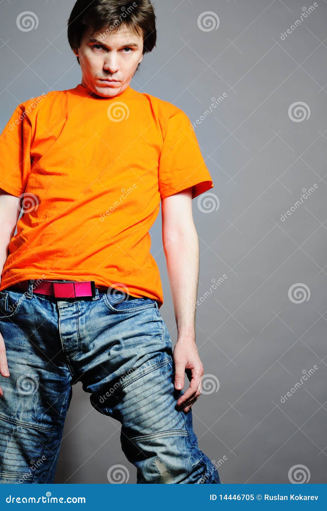 Man in orange shirt. stock image. Image of shirt, unshaven 14446705