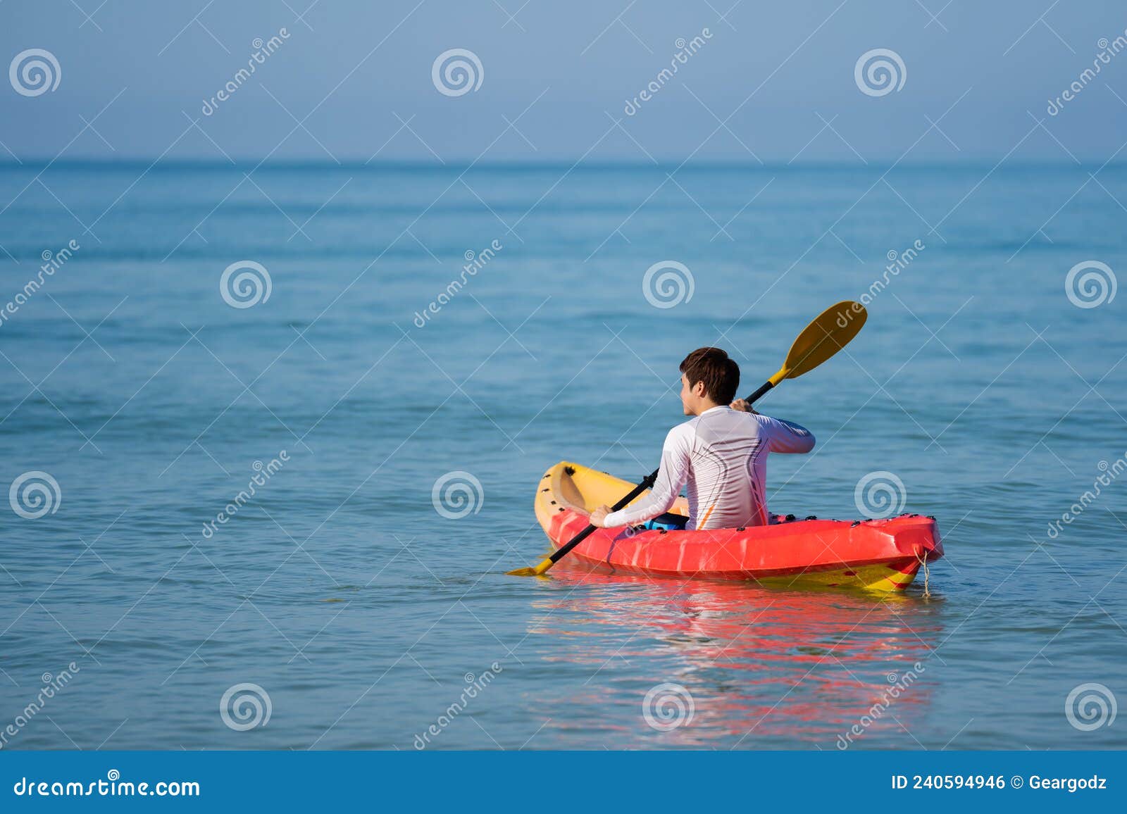 Man Paddling a Kayak Boat in Sea Stock Photo Image of outdoors, male 240594946