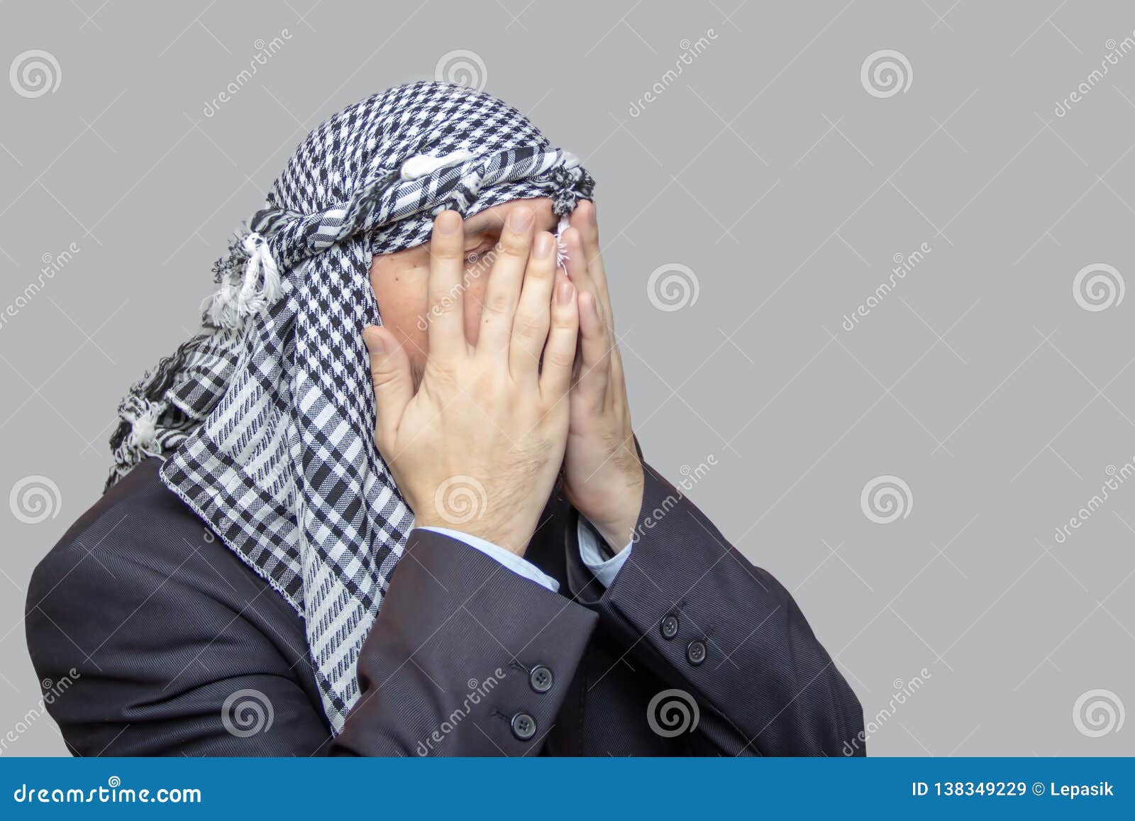 A Man in a Palestinian Scarf, the Eastern Way of Praying in