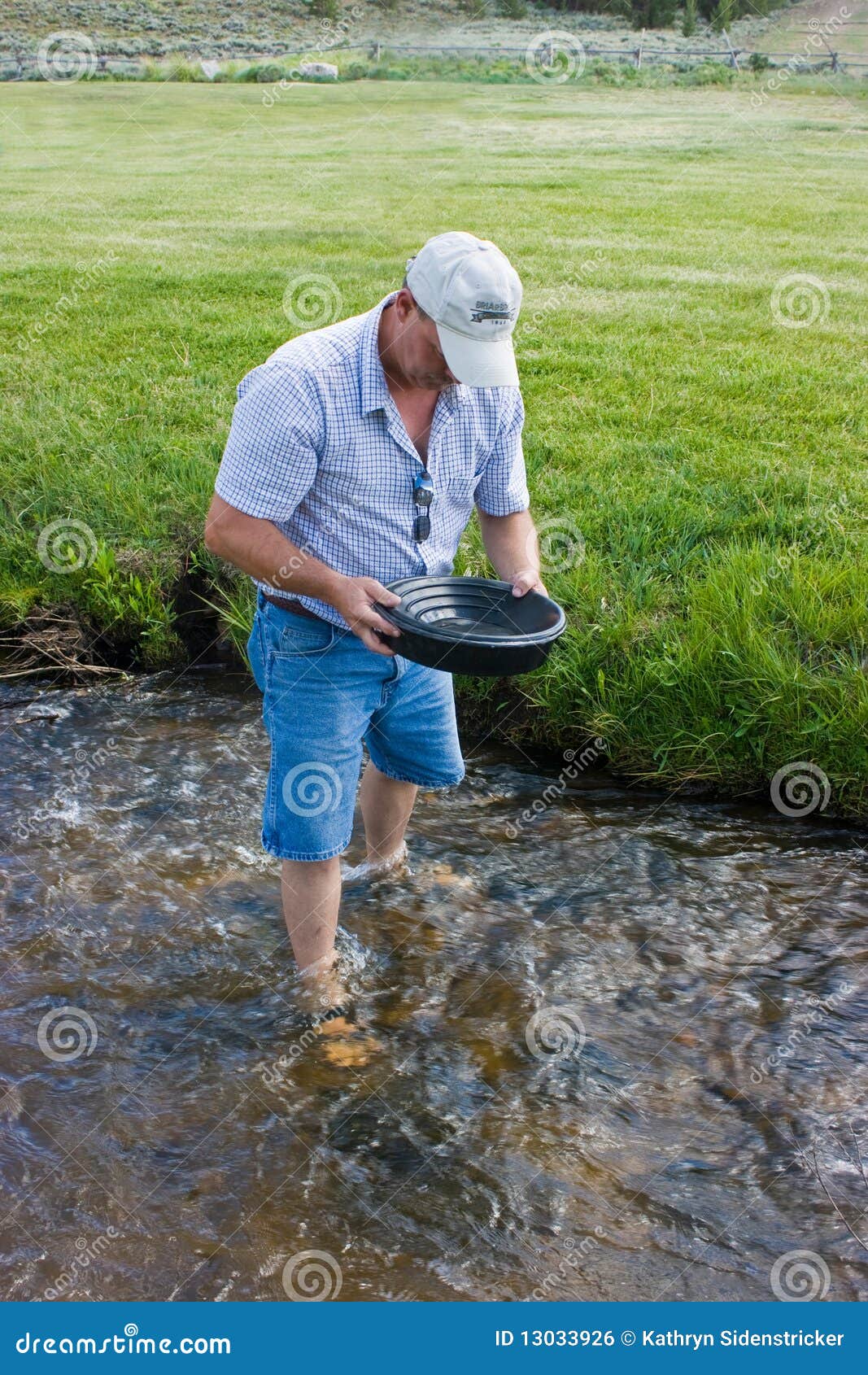 man panning for gold