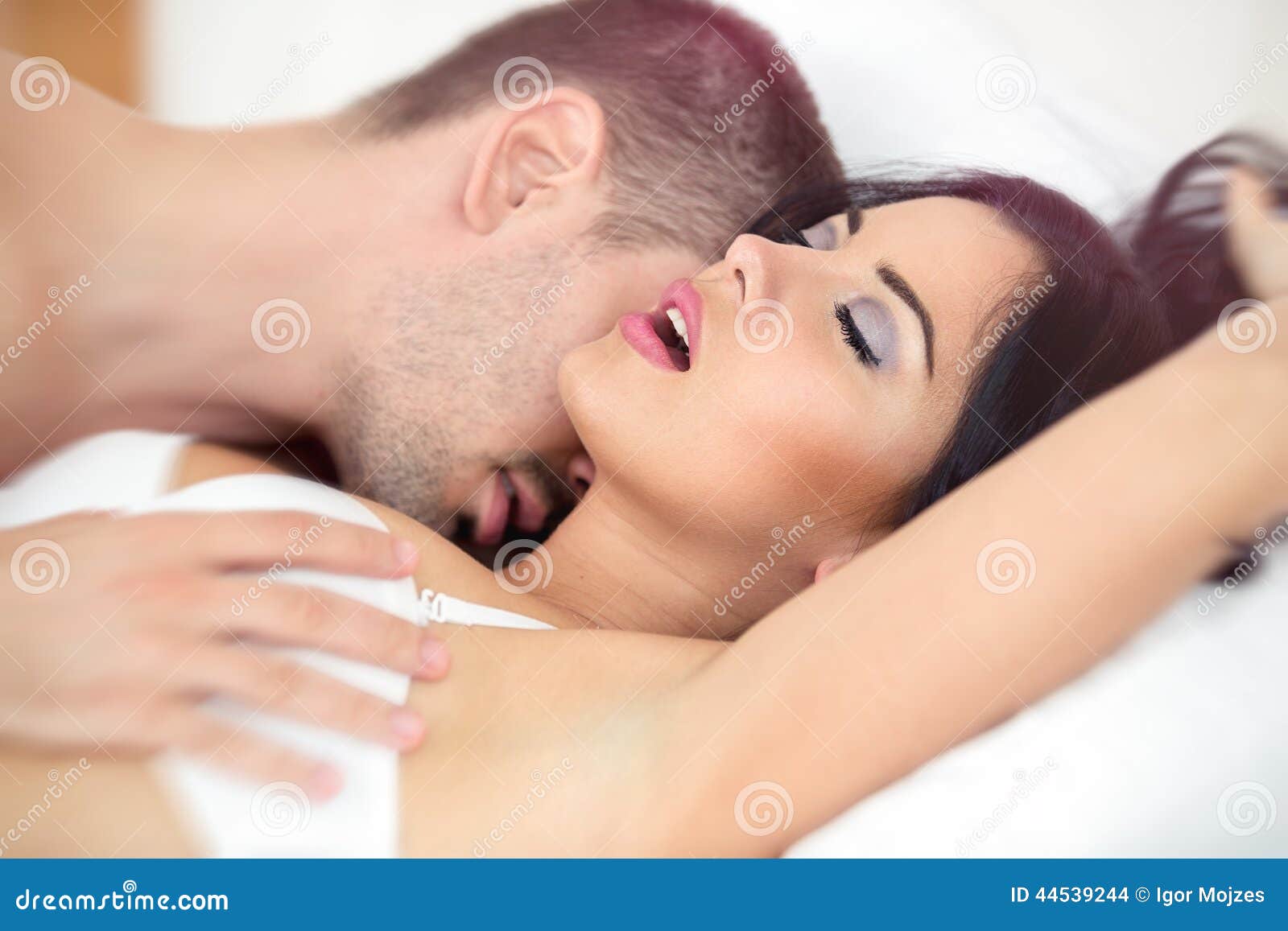 Man Passionately Engaged in Sex Stock Photo image