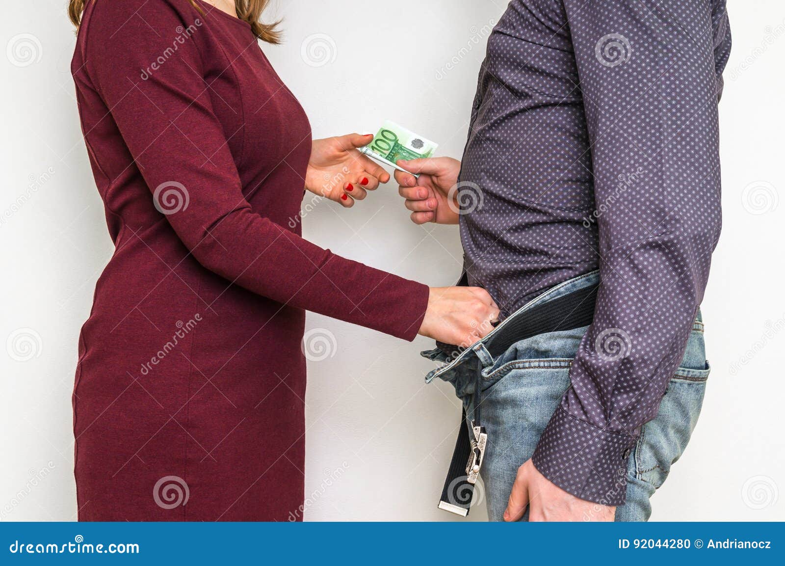 Man paying woman for sex stock photo