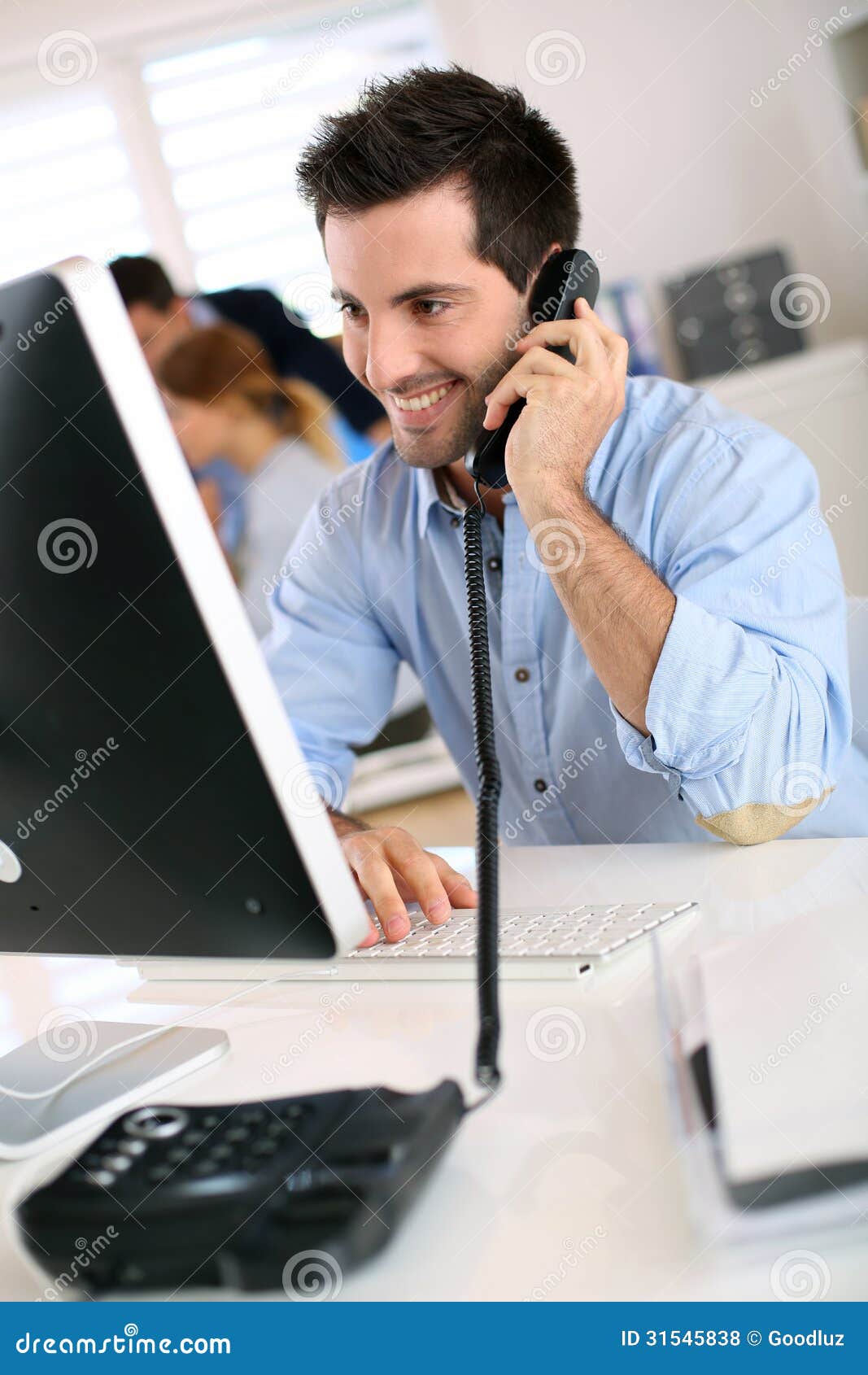 man on the phone in office stock photo image of client on the phone sign