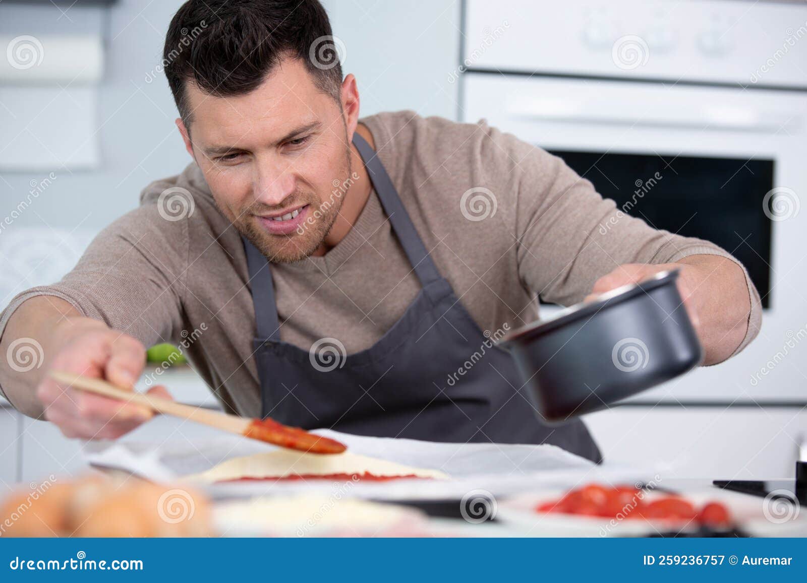 Man pizza cooking at home stock image. Image of pastry 259236757