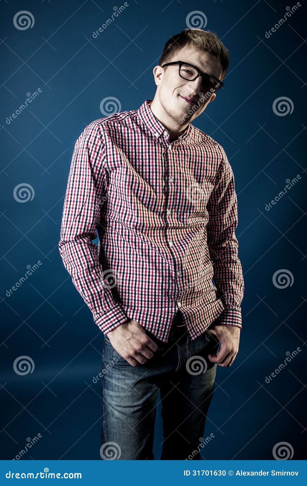 Man in a Plaid Shirt, Jeans, and Glasses Stock Photo Image of face