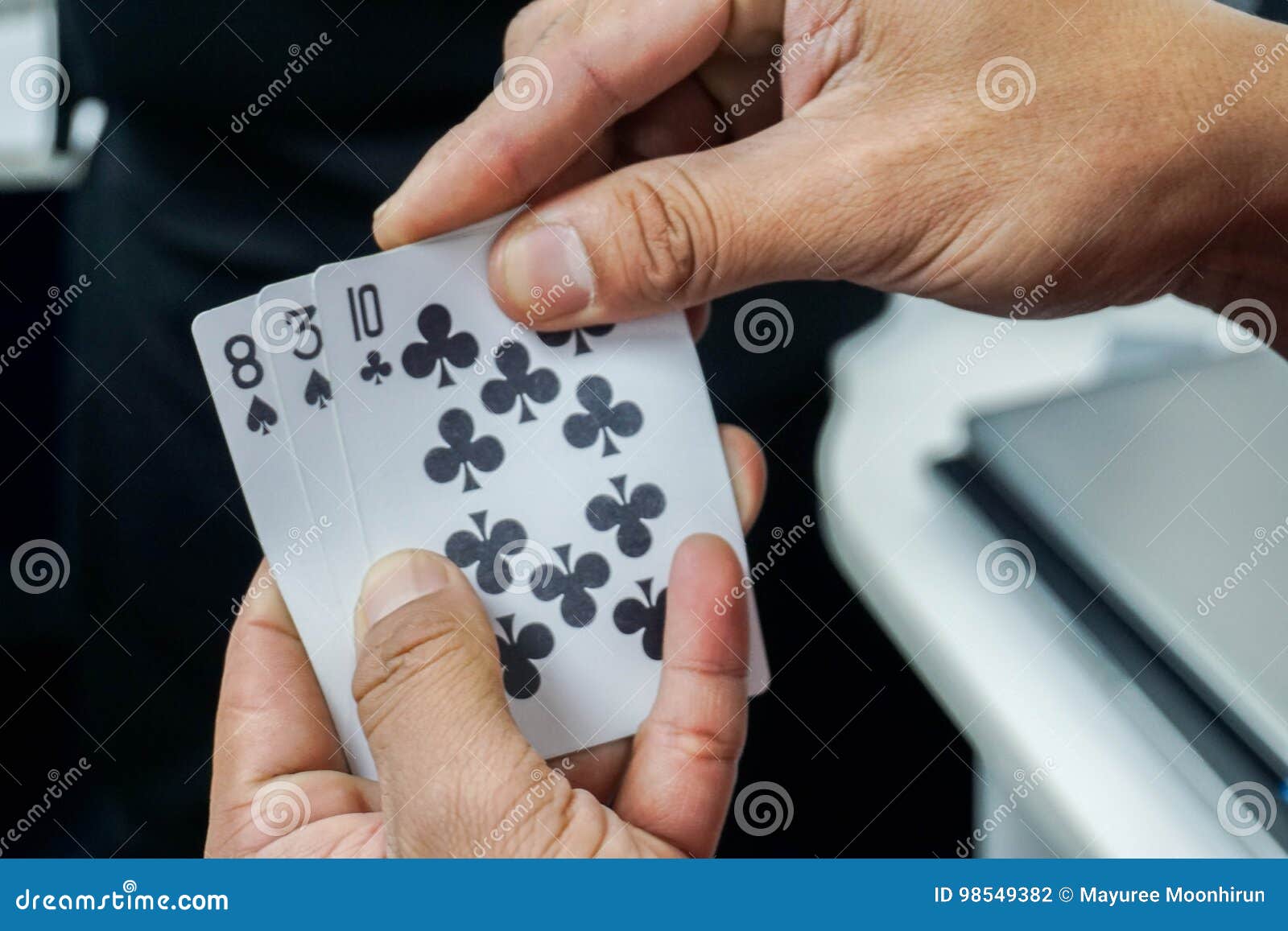 Man Play Poker Card in Hands for Gambling Stock Photo Image of game