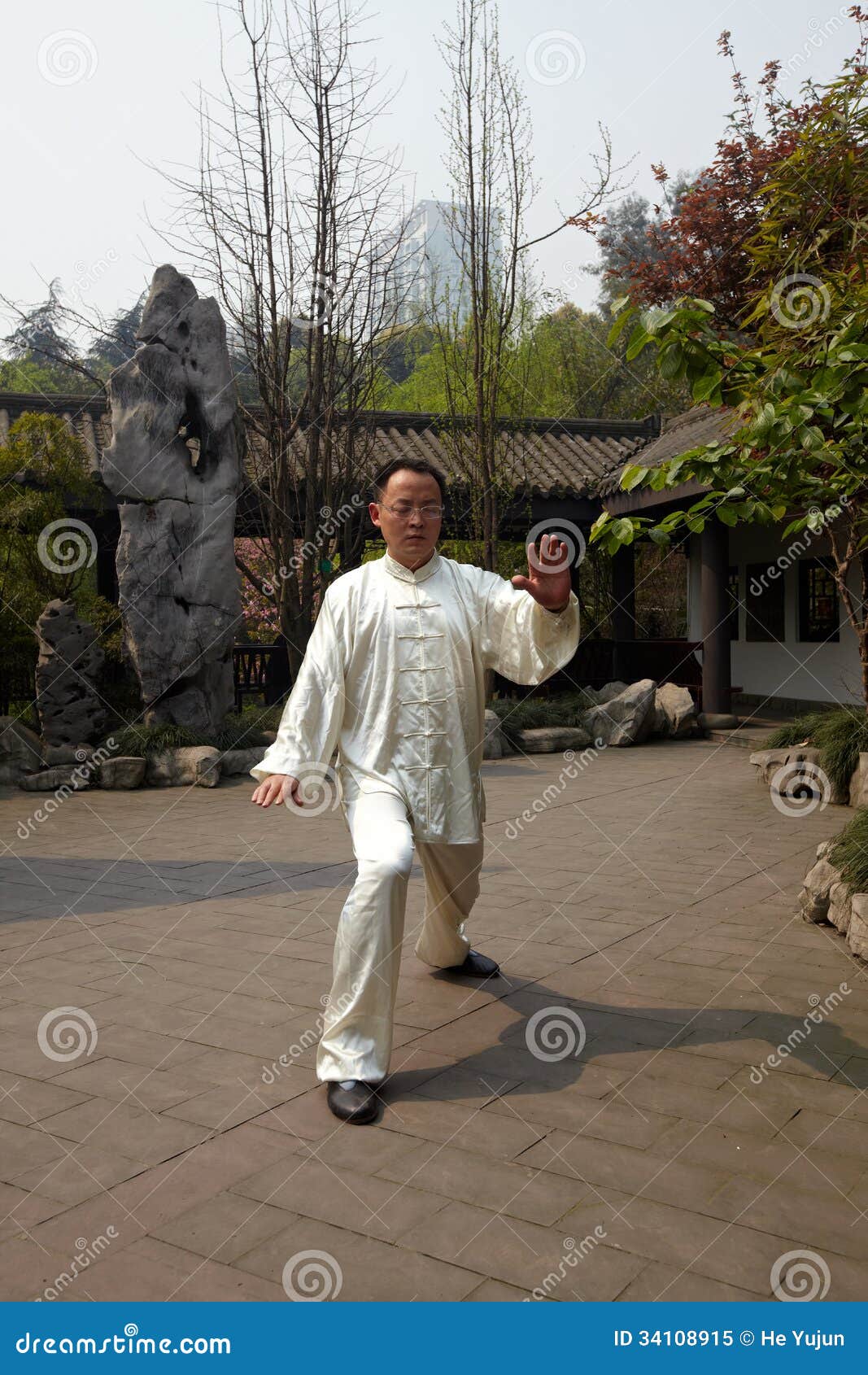 Man play taiji boxing. Chinese man play a kind of traditional shadowboxing (tai chi chuan) in ChongQing ,Southwest of China