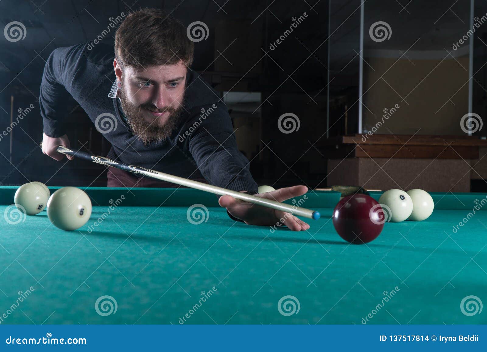 Man Playing Billiards. Look at the Ball. Stock Photo Image of