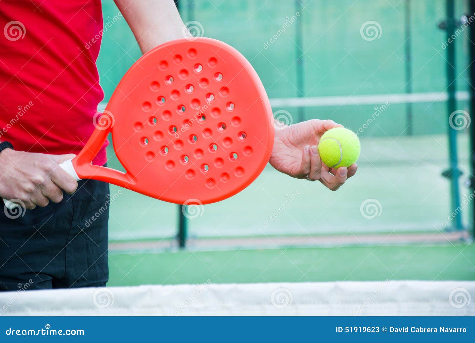 Man playing paddle tennis. stock image. Image of racket 51919623