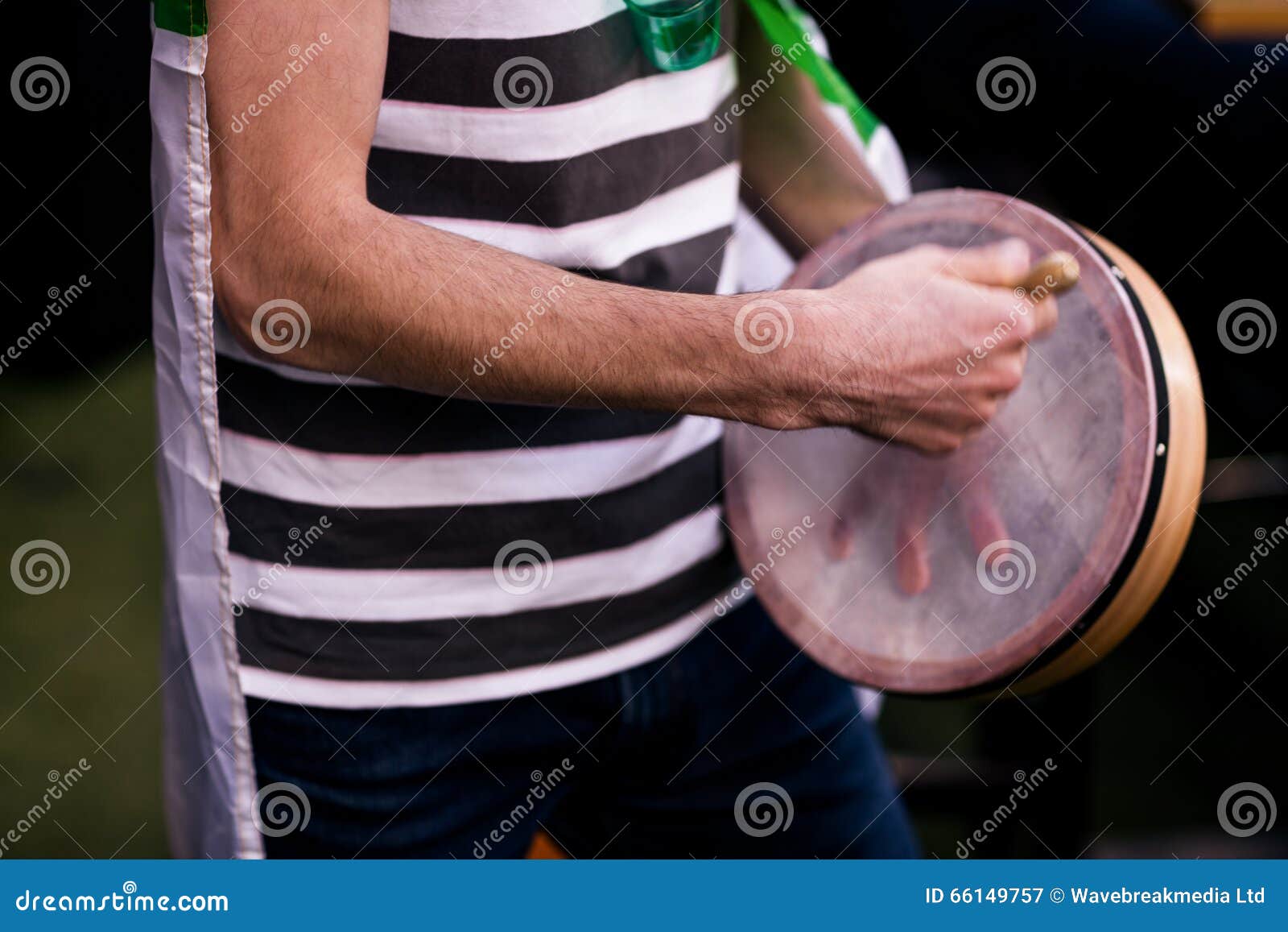 Man playing tambourine stock image. Image of holding 66149757