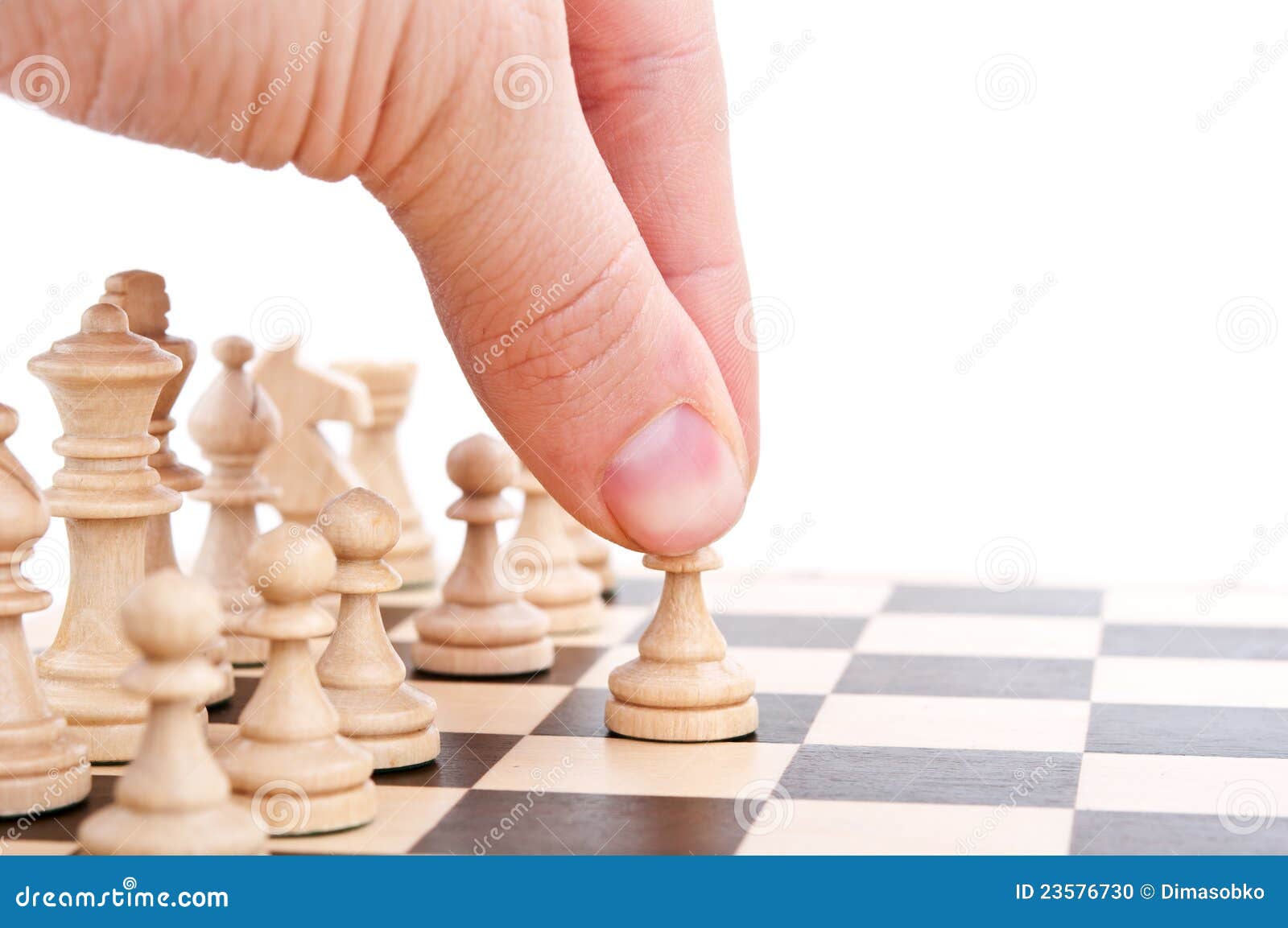 Hand Of A Man Taking A Chess Piece To Make The Next Move In A Chess Game.  Close Up. Spring Day Outside. Stock Photo, Picture and Royalty Free Image.  Image 198493516.