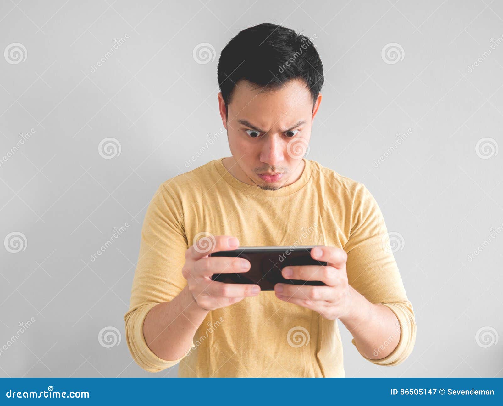 Man plays game seriously. stock image. Image of chat - 86505147