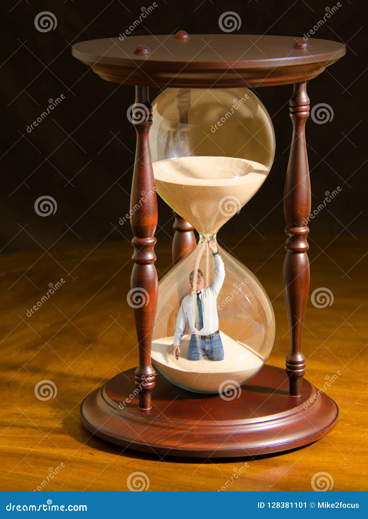 man plugging hole inside hour glass trying to slow the flow of sand and stop time