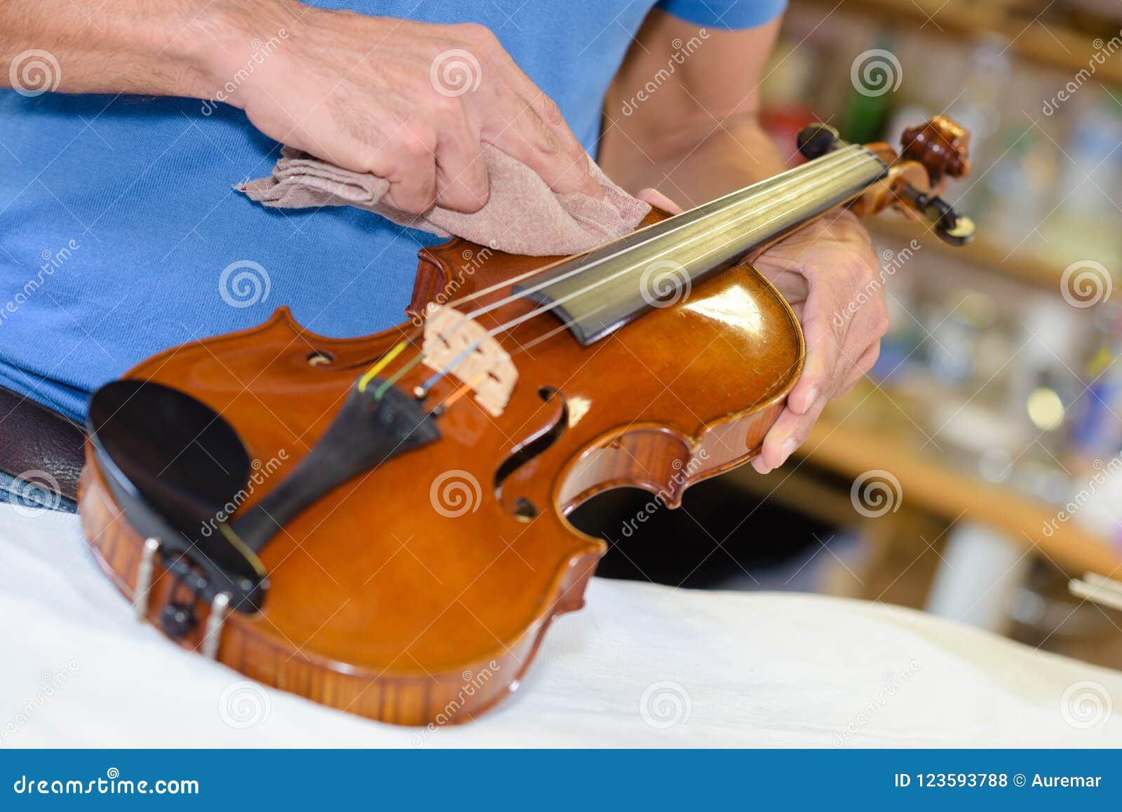 Man Polishing Violin with Cloth Stock Photo Image of caucasian, wood