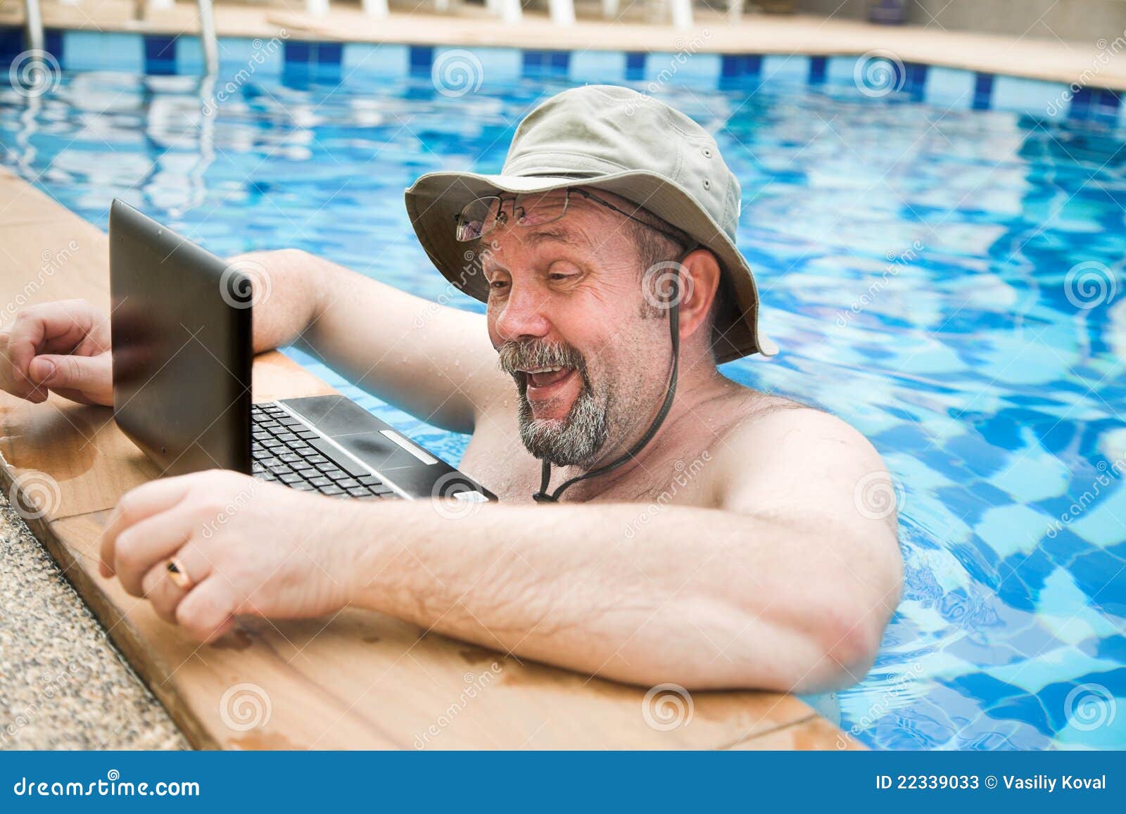 Man in pool with laptop stock image. Image of blue, 22339033
